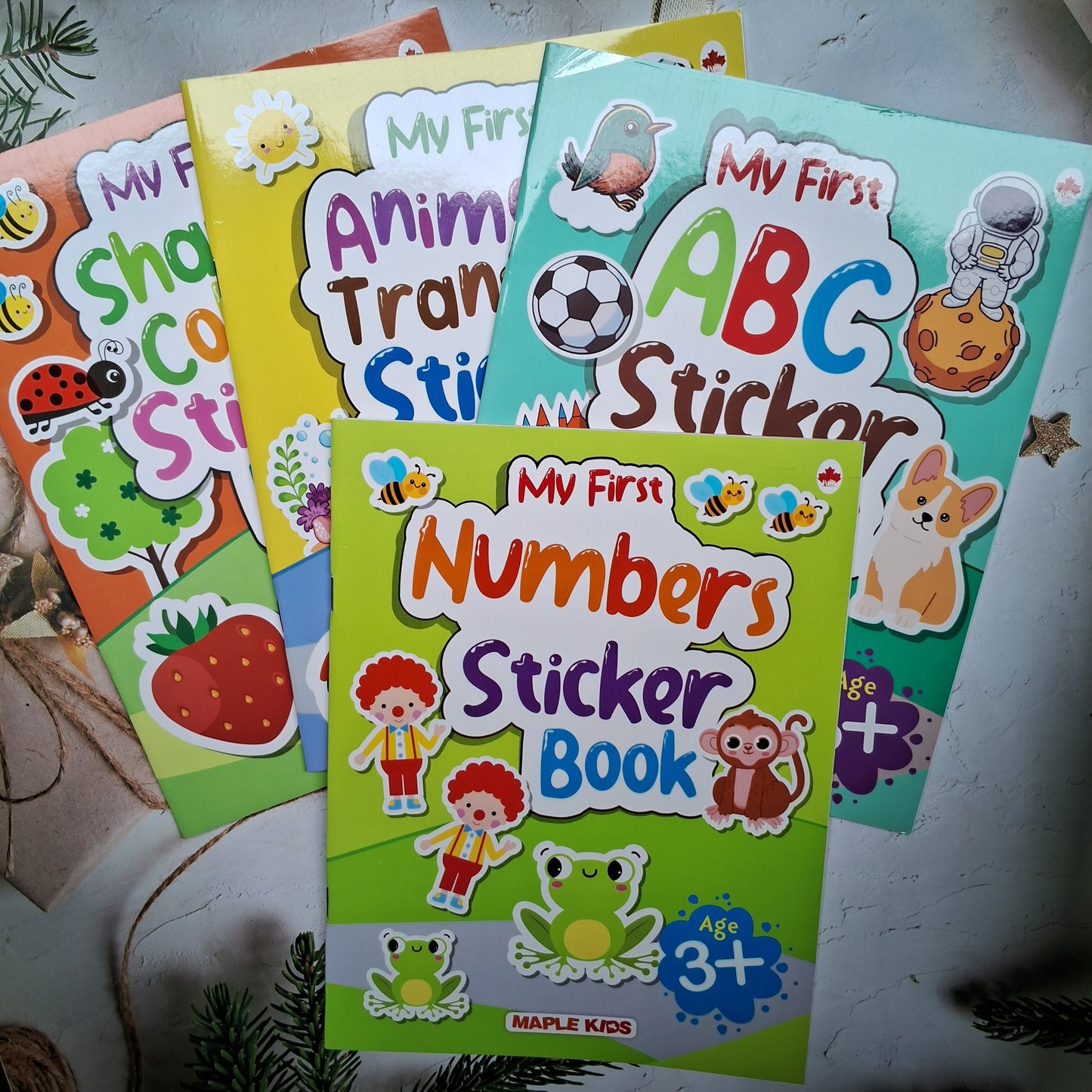 My First Sticker Books - Alphabet, Numbers, Shapes and 
Colours, Animals and Transport