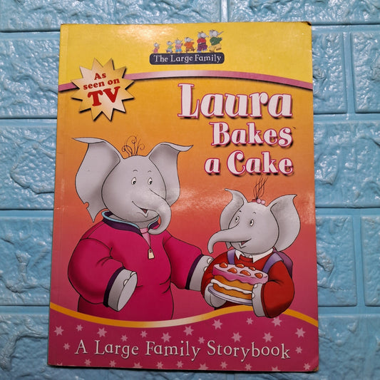 Laura Bakes a Cake - Very Good Condition Paperback - We Are Turners